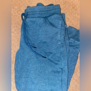 Teal sweatpants, lightly worn